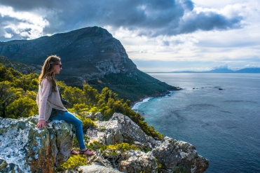 Darwin's sister looks out at the False Bay vista on a short trail in Cape Point National Park.
