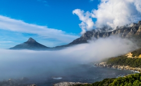 The road along the water in Cape Town is worth a drive, and with a bunch of pull outs, photo opportunities are everywhere. Here, from Ouderkraal Beach, Lion's Head and Table Mountain burst out of the fog.